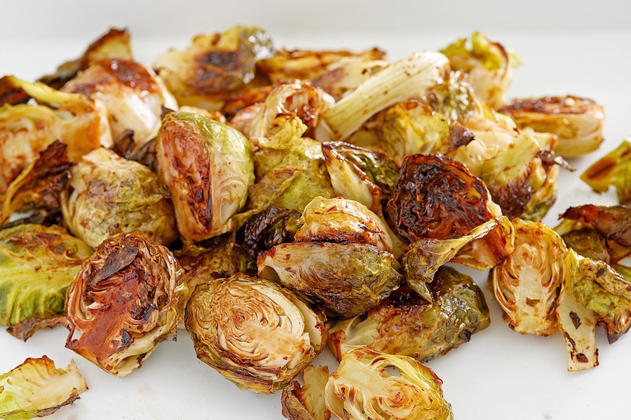 https://thepaleodiet.imgix.net/images/Roasted-Garlic-Balsamic-Brussels-Sprouts_FINAL02.jpg?auto=compress%2Cformat&crop=focalpoint&fit=crop&fp-x=0.5&fp-y=0.5&q=95&w=900